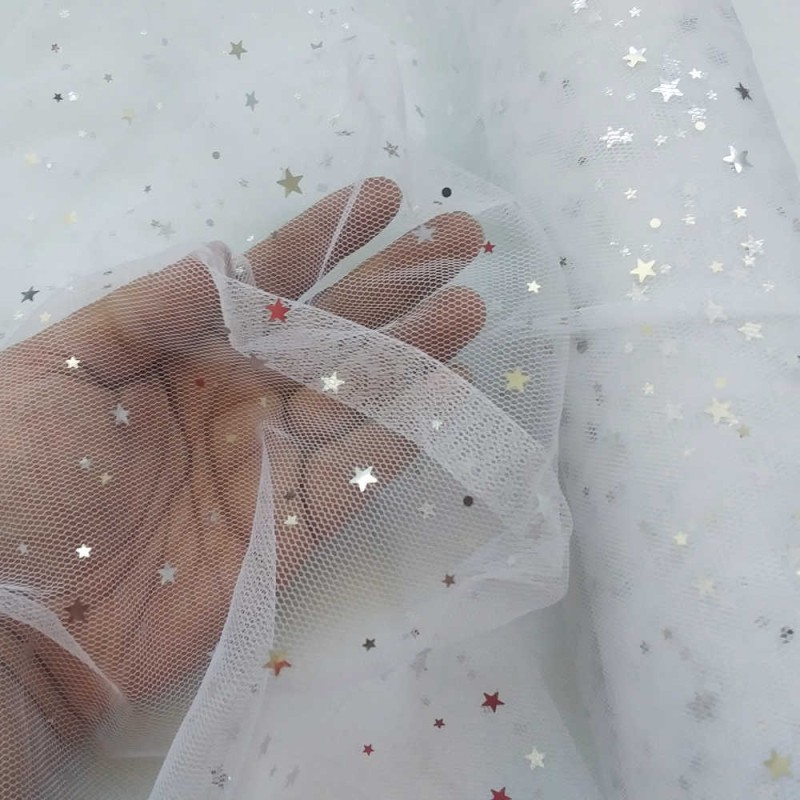 Tulle étoiles blanc au mètre