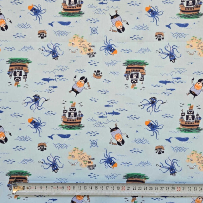 Cotone-PIRATA-fondo-azzurro | comprare cotone stampato