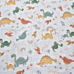 Doppia garza di cotone al metro.Stampa dinosauri.